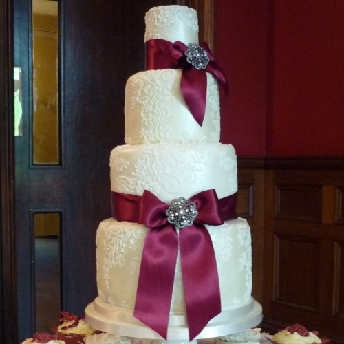 Ivory Vintage Lace 4-Tier Wedding Cake and Cupcakes